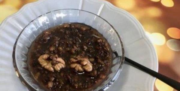 How to make black rice and walnut porridge?